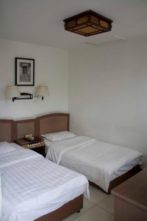 Three Legged Frog Hostel Пекин Стая снимка