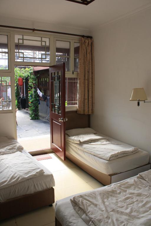 Three Legged Frog Hostel Пекин Стая снимка